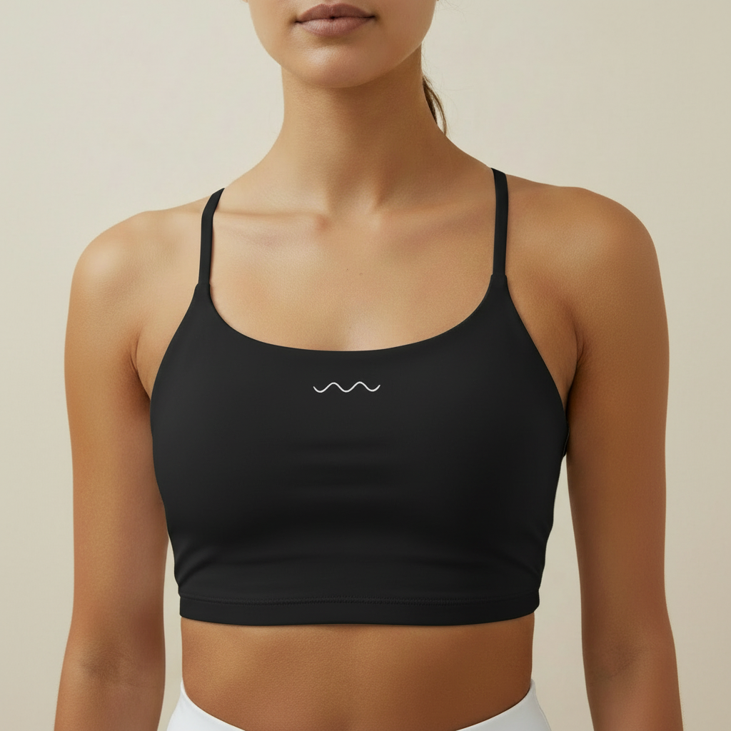 Black crop top close-up on model