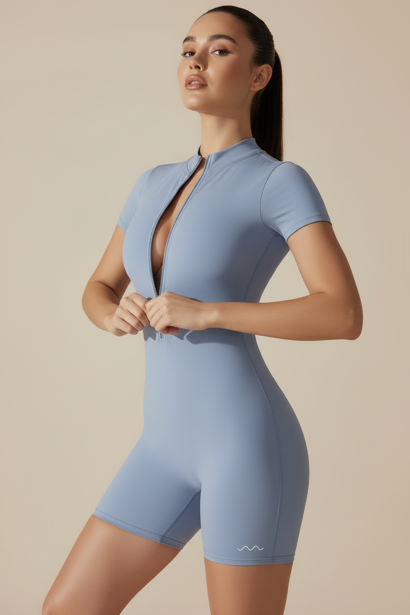 Blue romper with logo on leg