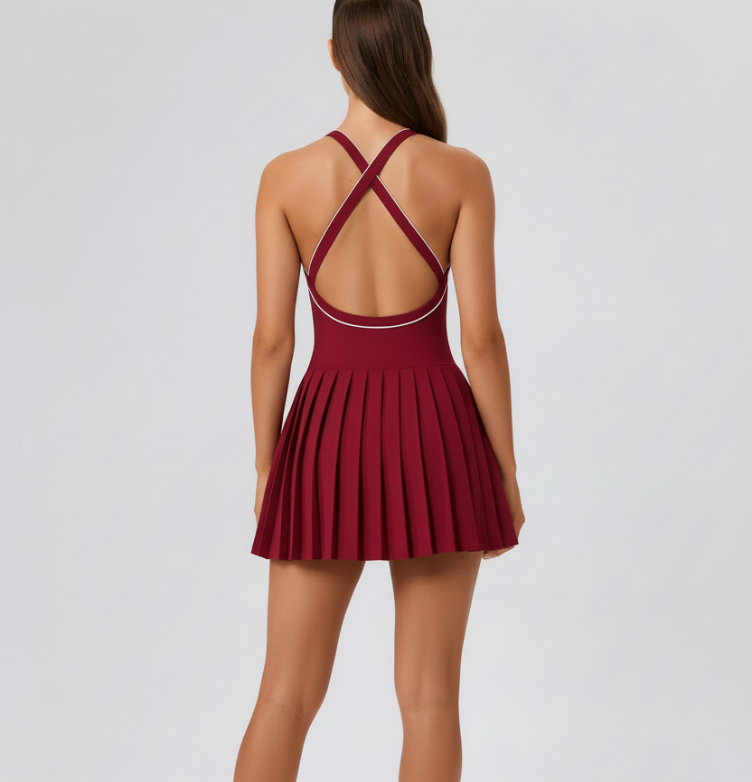 Burgundy pleated tennis dress - back view with high bun